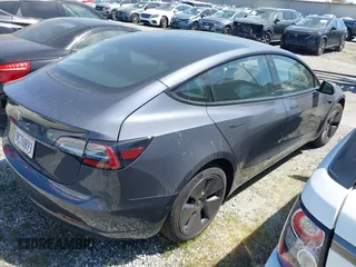 2022 Tesla Model 3 with VIN 5YJ3E1EA0NF344782, listed as a IAAI auction lot 41803469 with 16,973 mi miles and . Bid and sale history available at DreamBid. Image 4.