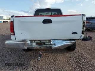 2000 Ford F-250 XL with VIN 1FTNX21FXYEE45263, listed as a Copart auction lot 55044075 with 451,212 mi miles and Salvage title. Bid and sale history available at DreamBid. Image 6.