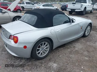 2004 BMW Z4 2.5i with VIN 4USBT334X4LS48707, listed as a IAAI auction lot 41737439 with 92,640 mi miles and . Bid and sale history available at DreamBid. Image 4.