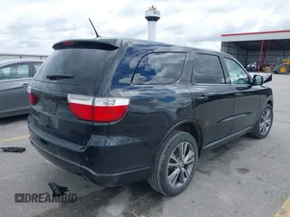 2013 Dodge Durango SXT with VIN 1C4RDJAG4DC697450, listed as a IAAI auction lot 42336657 with 177,476 mi miles and . Bid and sale history available at DreamBid. Image 4.