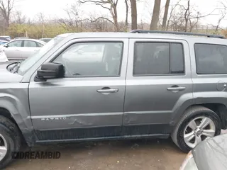 2013 Jeep Patriot Latitude with VIN 1C4NJPFB8DD129848, listed as a IAAI auction lot 40949386 with 168,839 mi miles and . Bid and sale history available at carsss.com. Image 14.