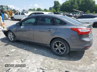 2012 Ford Focus SE with VIN 1FAHP3F20CL461605, listed as a Copart auction lot 59574835 with 119,881 mi miles and Salvage title. Bid and sale history available at DreamBid. Image 2.
