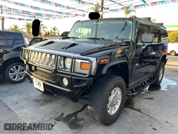 2003 Hummer H2 with VIN 5GRGN23U23H145183, listed as a Copart auction lot 84566884 with 85,945 mi miles and Clean Title. Bid and sale history available at carsss.com. Image 2.