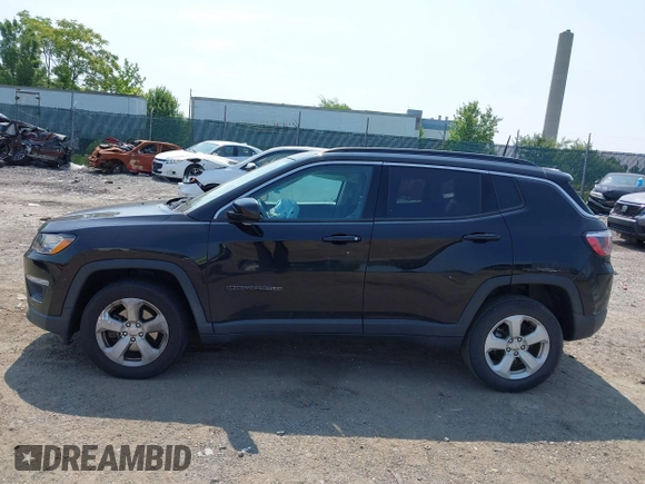 2018 Jeep Compass Latitude with VIN 3C4NJDBB1JT191490, listed as a IAAI auction lot 42429761 with 61,100 mi miles and . Bid and sale history available at DreamBid. Image 14.