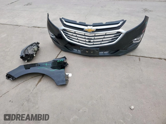 2021 Chevrolet Equinox Premier z VIN 2GNAXNEV9M6136701, wystawiony jako Copart lot #57288215 z przebiegiem 62 808 mil mil oraz Szkoda całkowita • Salvage title. Historia ofert i sprzedaży dostępna na DreamBid. Obrazek 12.