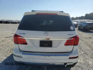 2016 Mercedes-Benz GL with VIN 4JGDF6EEXGA696311, listed as a Copart auction lot 77358304 with 113,398 mi miles and Salvage Title. Bid and sale history available at carsss.com. Image 6.
