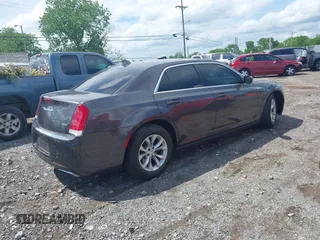 2016 Chrysler 300 Anniversary Edition with VIN 2C3CCAAG7GH135704, listed as a IAAI auction lot 42166589 with 134,955 mi miles and . Bid and sale history available at DreamBid. Image 4.