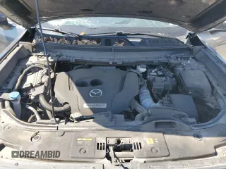 2021 Mazda CX-9 Touring z VIN JM3TCACY5M0500924, wystawiony jako Copart lot #50654505 z przebiegiem 57 067 mil mil oraz Szkoda całkowita • Salvage title. Historia ofert i sprzedaży dostępna na DreamBid. Obrazek 12.