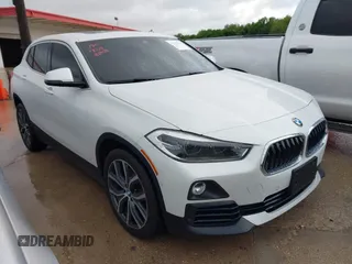2019 BMW X2 sDrive28i z VIN WBXYJ3C54KEP77637, wystawiony jako IAAI lot #41980563 z przebiegiem 104 617 mil mil oraz . Historia ofert i sprzedaży dostępna na DreamBid. Obrazek 1.