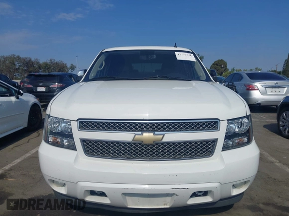 2013 Chevrolet Tahoe LTZ with VIN 1GNSKCE04DR374682, listed as a IAAI auction lot 42779526 with 139,533 mi miles and . Bid and sale history available at DreamBid. Image 12.