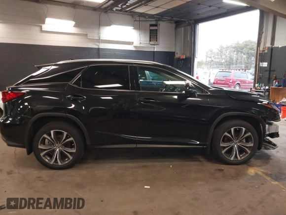 2021 Lexus RX with VIN 2T2HZMDA2MC279445, listed as a IAAI auction lot 41913178 with 38,598 mi miles. Bid and sale history available at carsss.com. Image 14.