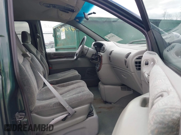 1999 Chrysler Town & Country with VIN 1C4GP54G6XB603564, listed as a IAAI auction lot 41823340 with 104,321 mi miles and . Bid and sale history available at DreamBid. Image 5.