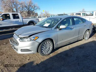 2015 Ford Fusion S Hybrid with VIN 3FA6P0UU7FR307568, listed as a IAAI auction lot 41421139 with 152,186 mi miles. Bid and sale history available at carsss.com. Image 18.