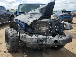 2009 Jeep Wrangler Unlimited Rubicon with VIN 1J4GA69199L713060, listed as a Copart auction lot 58543595 with 159,981 mi miles and Clean title. Bid and sale history available at DreamBid. Image 5.