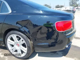 2017 Bentley Flying Spur z VIN SCBEH9ZA5HC063140, wystawiony jako IAAI lot #42120298 z przebiegiem 40 242 mil mil oraz . Historia ofert i sprzedaży dostępna na DreamBid. Obrazek 6.