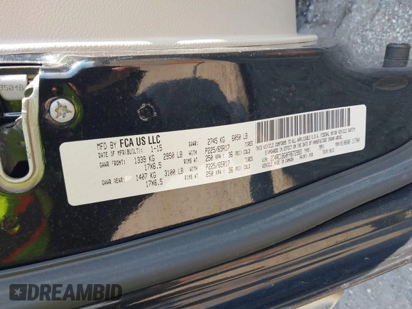 2015 Chrysler Town & Country Touring with VIN 2C4RC1BG0FR672993, listed as a IAAI auction lot 41797935 with 116,815 mi miles. Bid and sale history available at carsss.com. Image 9.