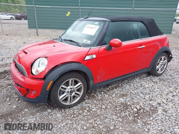 2014 MINI Convertible S с VIN WMWZP3C52ET706272, выставлен на аукционе IAAI как лот 42198277 с пробегом 40 372 миль миль и . История ставок и продаж доступна на DreamBid. Изображение 18.