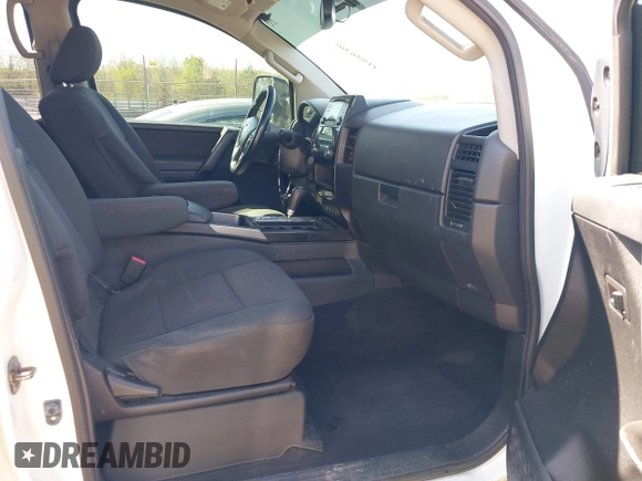 2014 Nissan Titan S with VIN 1N6AA0EC3EN502951, listed as a IAAI auction lot 41956309 with 128,464 mi miles and . Bid and sale history available at DreamBid. Image 5.