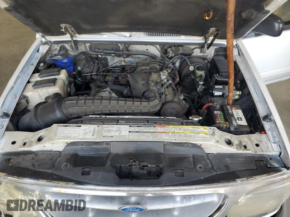 1996 Ford Explorer XL with VIN 1FMDU32X6TUD64045, listed as a Copart auction lot 65942264 with 138,750 mi miles and Salvage title. Bid and sale history available at DreamBid. Image 12.