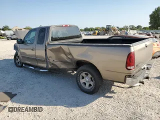 2002 Ford F-150 XL with VIN 1FTRX17L22NA48307, listed as a Copart auction lot 74238074 with 80,010 mi miles and Salvage title. Bid and sale history available at DreamBid. Image 2.