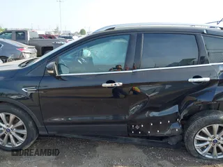 2018 Ford Escape Titanium with VIN 1FMCU9J95JUB30803, listed as a IAAI auction lot 42286536 with 63,309 mi miles and . Bid and sale history available at DreamBid. Image 15.