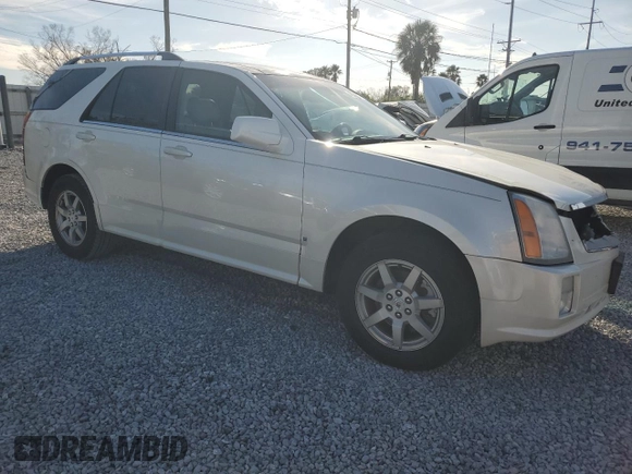 2009 Cadillac SRX RWD z VIN 1GYEE637590113453, wystawiony jako Copart lot #42596675 z przebiegiem 115 118 mil mil oraz Szkoda całkowita • Salvage title. Historia ofert i sprzedaży dostępna na DreamBid. Obrazek 4.