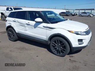 2014 Land Rover Range Rover Evoque Pure z VIN SALVN2BG3EH936743, wystawiony jako IAAI lot #42031683 z przebiegiem 123 948 mil mil oraz . Historia ofert i sprzedaży dostępna na DreamBid. Obrazek 1.