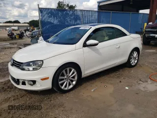 2012 Volkswagen Eos Komfort with VIN WVWBW7AHXCV013608, listed as a Copart auction lot 80592764 with 139,675 mi miles and Salvage Title. Bid and sale history available at DreamBid. Image 1.