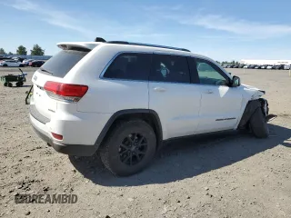 2017 Jeep Grand Cherokee Laredo z VIN 1C4RJFAG6HC618162, wystawiony jako Copart lot #56150195 z przebiegiem 133 766 mil mil oraz Szkoda całkowita • Salvage title. Historia ofert i sprzedaży dostępna na DreamBid. Obrazek 3.
