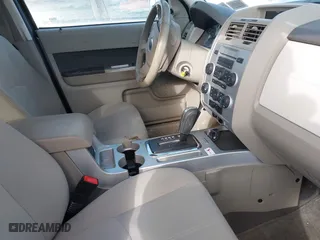 2009 Mercury Mariner with VIN 4M2CU91GX9KJ08073, listed as a IAAI auction lot 41404100 with 90,466 mi miles. Bid and sale history available at carsss.com. Image 5.