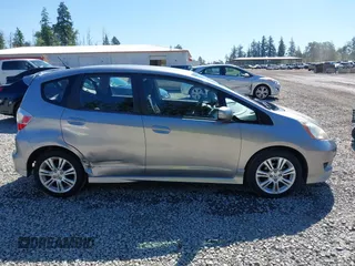 2009 Honda Fit Sport z VIN JHMGE88489S001452, wystawiony jako IAAI lot #42316783 z przebiegiem 129 856 mil mil oraz . Historia ofert i sprzedaży dostępna na DreamBid. Obrazek 13.