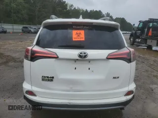 2018 Toyota RAV4 XLE with VIN 2T3WFREV9JW405921, listed as a Copart auction lot 50695175 with 133,019 mi miles and Salvage Title. Bid and sale history available at carsss.com. Image 6.
