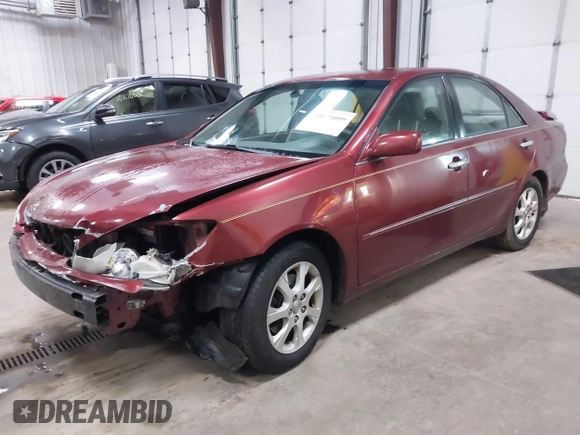 2005 Toyota Camry LE with VIN 4T1BF30KX5U099450, listed as a IAAI auction lot 41670099 with Not Provided miles and . Bid and sale history available at DreamBid. Image 2.