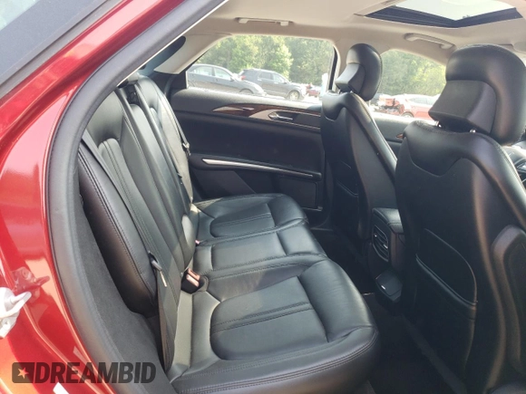 2015 Lincoln MKZ z VIN 3LN6L2GK2FR603783, wystawiony jako Copart lot #60038835 z przebiegiem 66 820 mil mil oraz Szkoda całkowita • Salvage title. Historia ofert i sprzedaży dostępna na DreamBid. Obrazek 10.