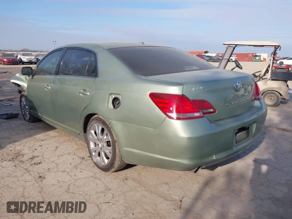 2010 Toyota Avalon XL with VIN 4T1BK3DB9AU354427, listed as a IAAI auction lot 41614018 with Not Provided miles and . Bid and sale history available at carsss.com. Image 3.