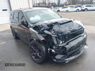 2023 Dodge Durango SRT Hellcat Premium with VIN 1C4SDJH90PC557375, listed as a IAAI auction lot 41328850 with 30,697 mi miles and . Bid and sale history available at DreamBid. Image 1.