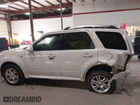 2009 Mercury Mariner Premier with VIN 4M2CU97729KJ00086, listed as a IAAI auction lot 41418490 with 167,486 mi miles. Bid and sale history available at carsss.com. Image 14.