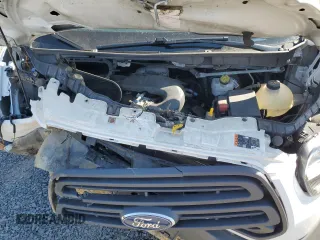 2018 Ford Transit с VIN 1FTBW3XMXJKB40404, выставлен на аукционе Copart как лот 50774585 с пробегом Не указан миль и Списание • Salvage title. История ставок и продаж доступна на DreamBid. Изображение 12.