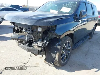2024 Chevrolet Tahoe RST with VIN 1GNSCRKD7RR224919, listed as a IAAI auction lot 41588409 with 17,247 mi miles and . Bid and sale history available at DreamBid. Image 6.