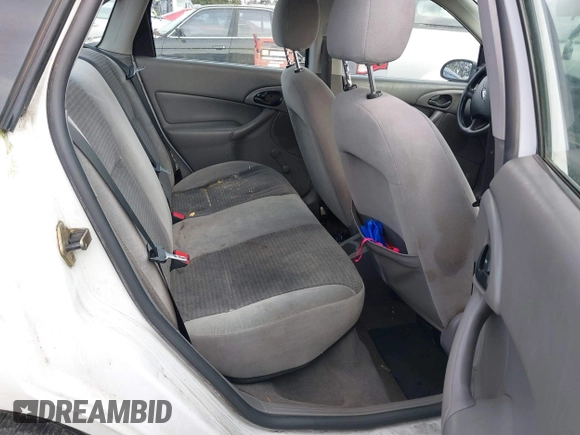 2003 Ford Focus LX with VIN 1FAFP33P73W156382, listed as a IAAI auction lot 41591885 with 174,169 mi miles and . Bid and sale history available at carsss.com. Image 8.