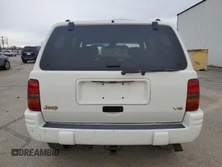 1998 Jeep Grand Cherokee Limited with VIN 1J4GZ78Y5WC259043, listed as a Copart auction lot 43976955 with 212,910 mi miles and Salvage Title. Bid and sale history available at carsss.com. Image 6.