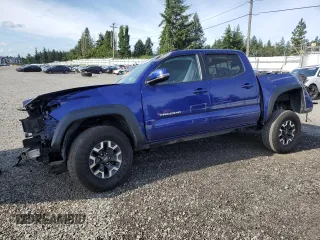 2023 Toyota Tacoma SR with VIN 3TMCZ5AN1PM591635, listed as a Copart auction lot 61608855 with 31,768 mi miles and Salvage title. Bid and sale history available at DreamBid. Image 1.