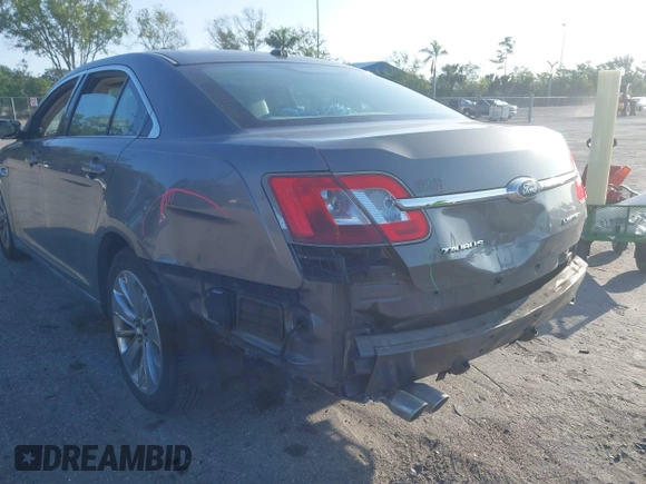 2011 Ford Taurus Limited with VIN 1FAHP2FW3BG117688, listed as a IAAI auction lot 41974469 with 215,036 mi miles and . Bid and sale history available at carsss.com. Image 12.