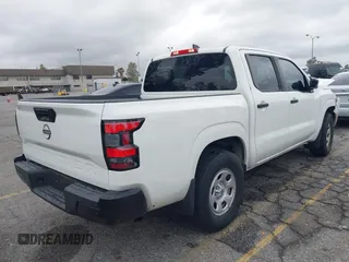 2022 Nissan Frontier S z VIN 1N6ED1EJ7NN608316, wystawiony jako IAAI lot #42047047 z przebiegiem 33 896 mil mil oraz . Historia ofert i sprzedaży dostępna na DreamBid. Obrazek 4.