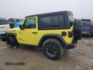 2023 Jeep Wrangler Rubicon with VIN 1C4HJXCG7PW693674, listed as a Copart auction lot 39764594 with 12,144 mi miles and . Bid and sale history available at DreamBid. Image 2.