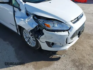 2017 Ford C-Max SE with VIN 1FADP5AU0HL117265, listed as a IAAI auction lot 41413374 with 64,660 mi miles. Bid and sale history available at carsss.com. Image 6.