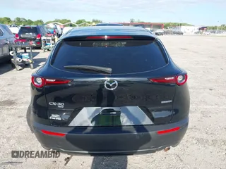2023 Mazda CX-30 S Select with VIN 3MVDMBBM9PM508958, listed as a IAAI auction lot 42009029 with 21,219 mi miles and . Bid and sale history available at DreamBid. Image 17.