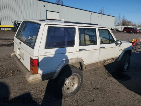 1993 Jeep Cherokee Country with VIN 1J4FJ78S0PL565292, listed as a Copart auction lot 83214974 with 233,925 mi miles and Clean Title. Bid and sale history available at carsss.com. Image 3.
