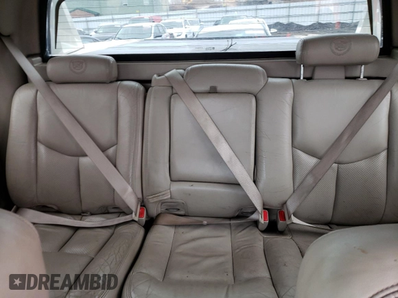 2003 Cadillac Escalade EXT z VIN 3GYEK63N13G145634, wystawiony jako Copart lot #47593375 z przebiegiem 287 512 mil mil oraz Nie do naprawy. Historia ofert i sprzedaży dostępna na DreamBid. Obrazek 10.