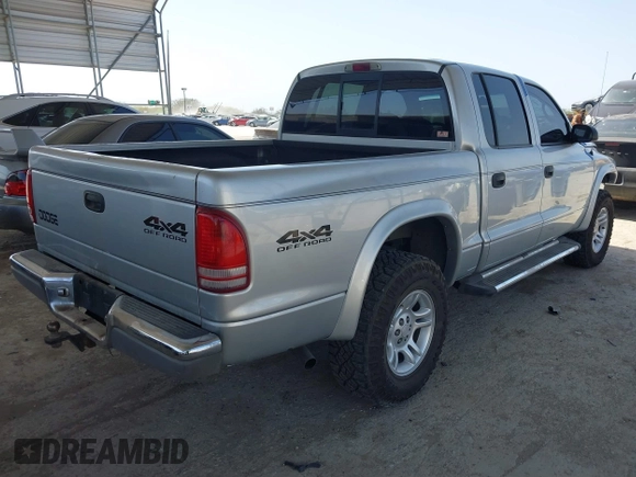 2002 Dodge Dakota SLT with VIN 1B7HG48N62S546119, listed as a IAAI auction lot 41826998 with 157,761 mi miles. Bid and sale history available at carsss.com. Image 4.